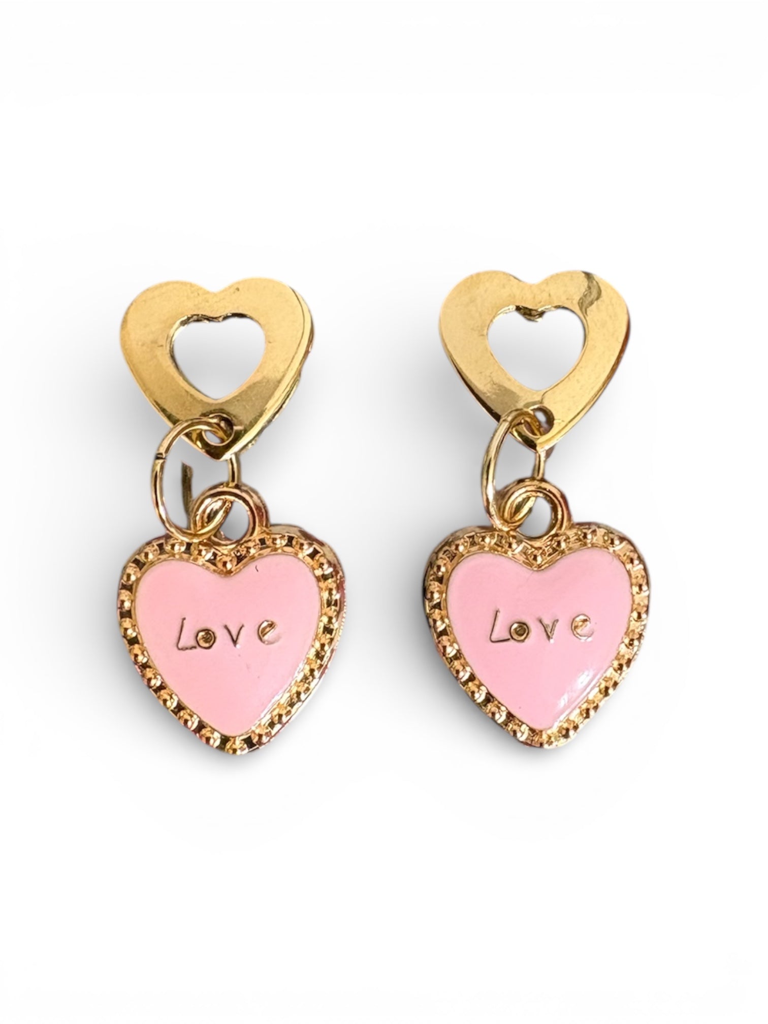 Heart-shaped earrings with pink centers and gold accents on a white background