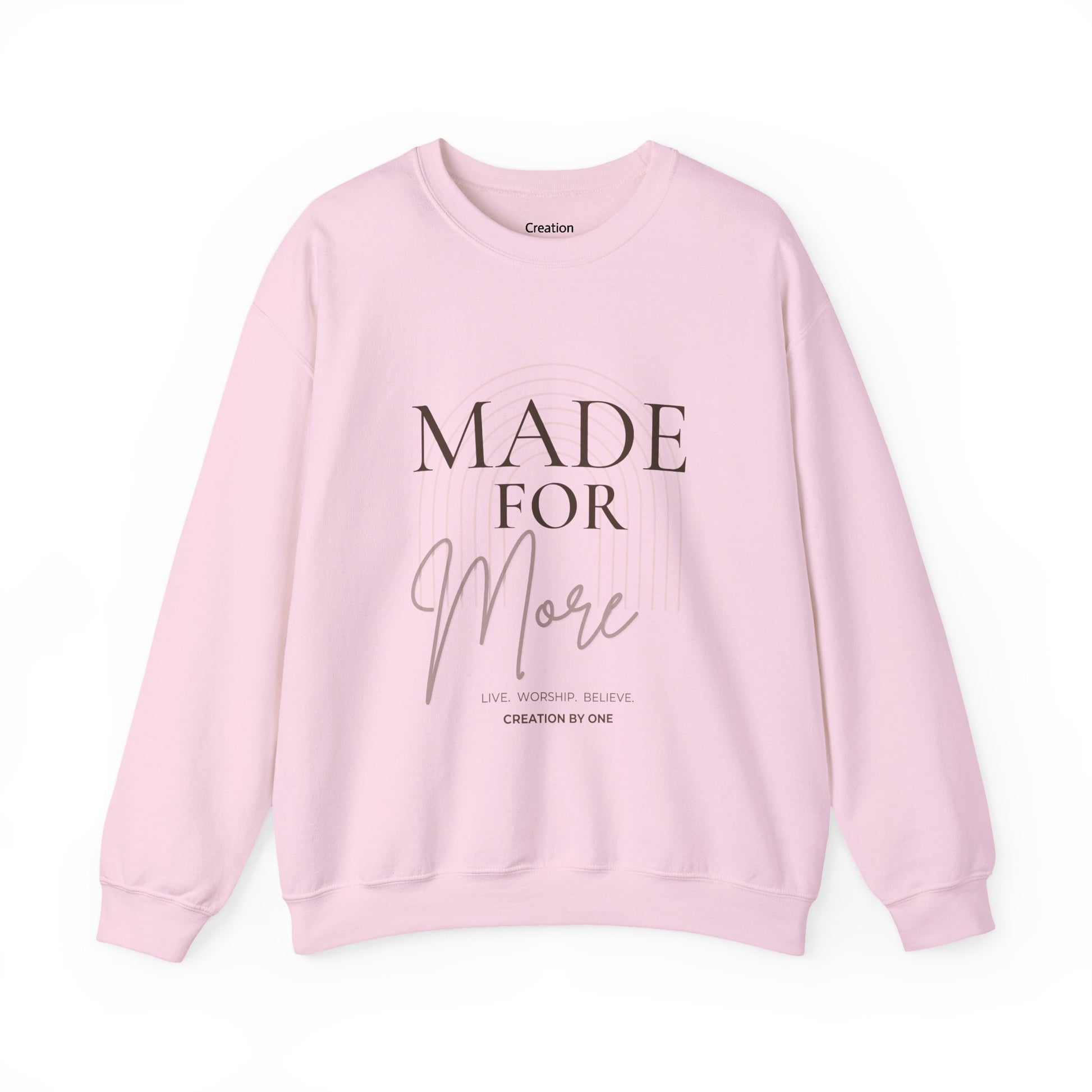 Pink sweatshirt with 'Made for More' text on a white background