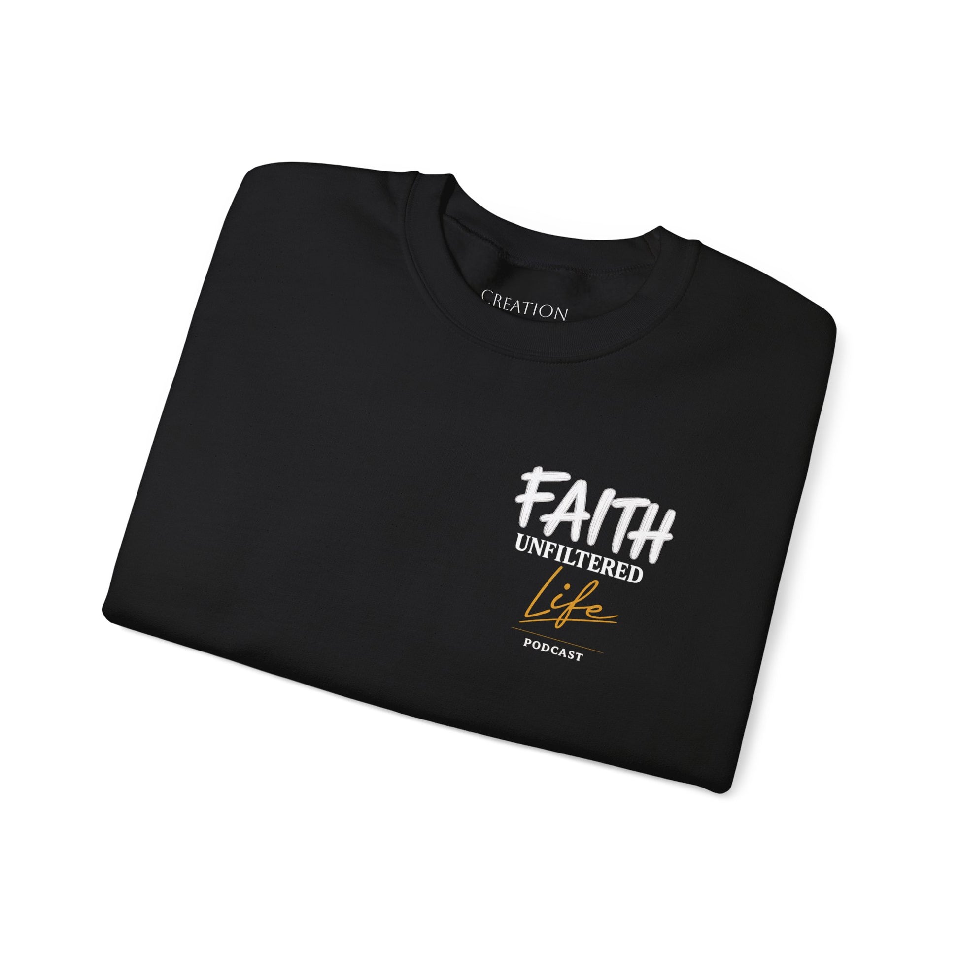 Folded black t-shirt with 'No Excuse for Abuse' text on a white background