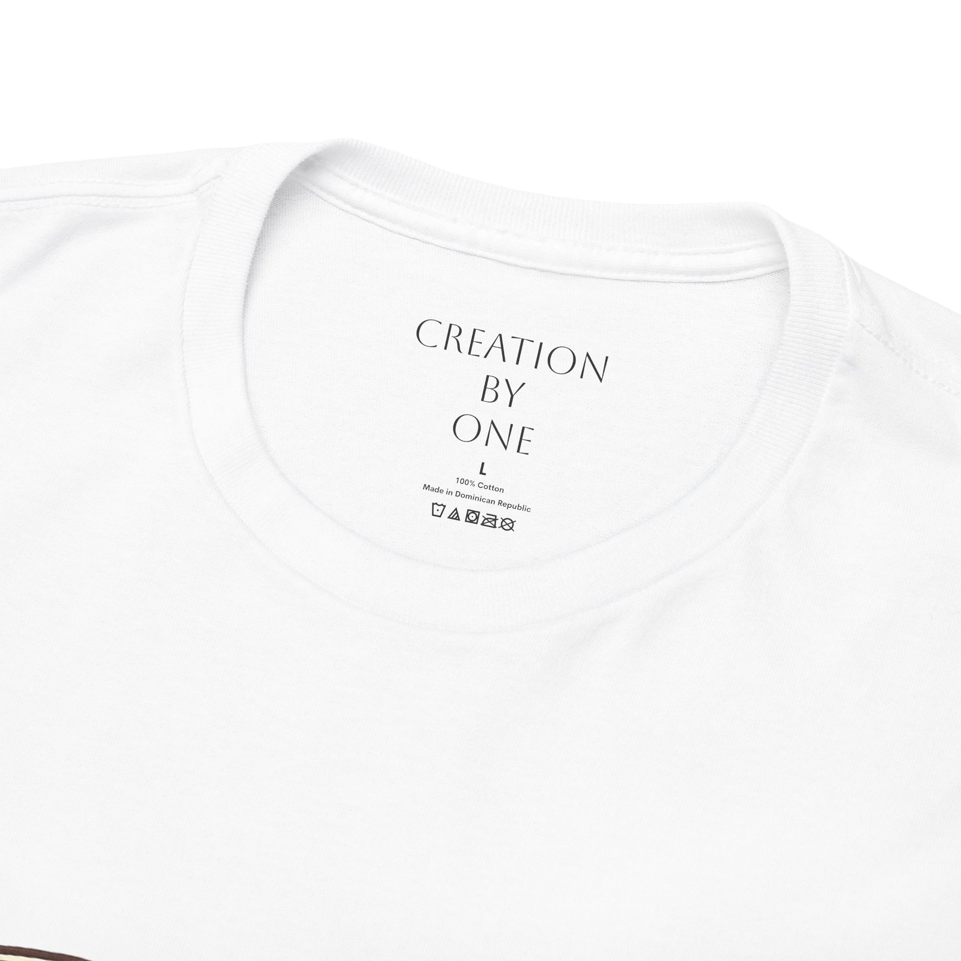 White t-shirt with 'Creation by One' text on a white background