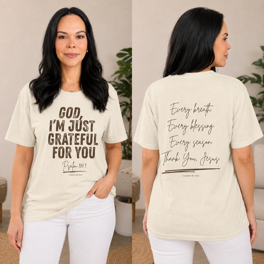 A woman modeling a cream-colored graphic t-shirt, shown from both the front and back. The front features the text 'GOD, I'M JUST GRATEFUL FOR YOU' in brown lettering, and the back displays a matching brown script quote from Philippians 4:19.
