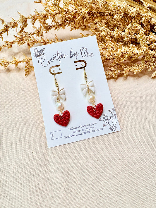 Gold bow and pearl heart earrings with red heart charm and 14K gold plated hooks by Creation by One