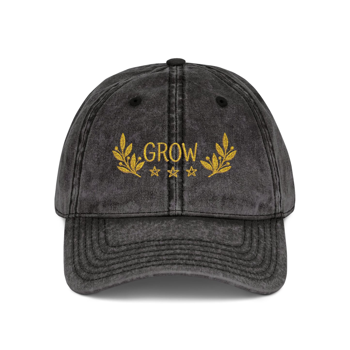 A hat that says Grow in gold with a  black hat.