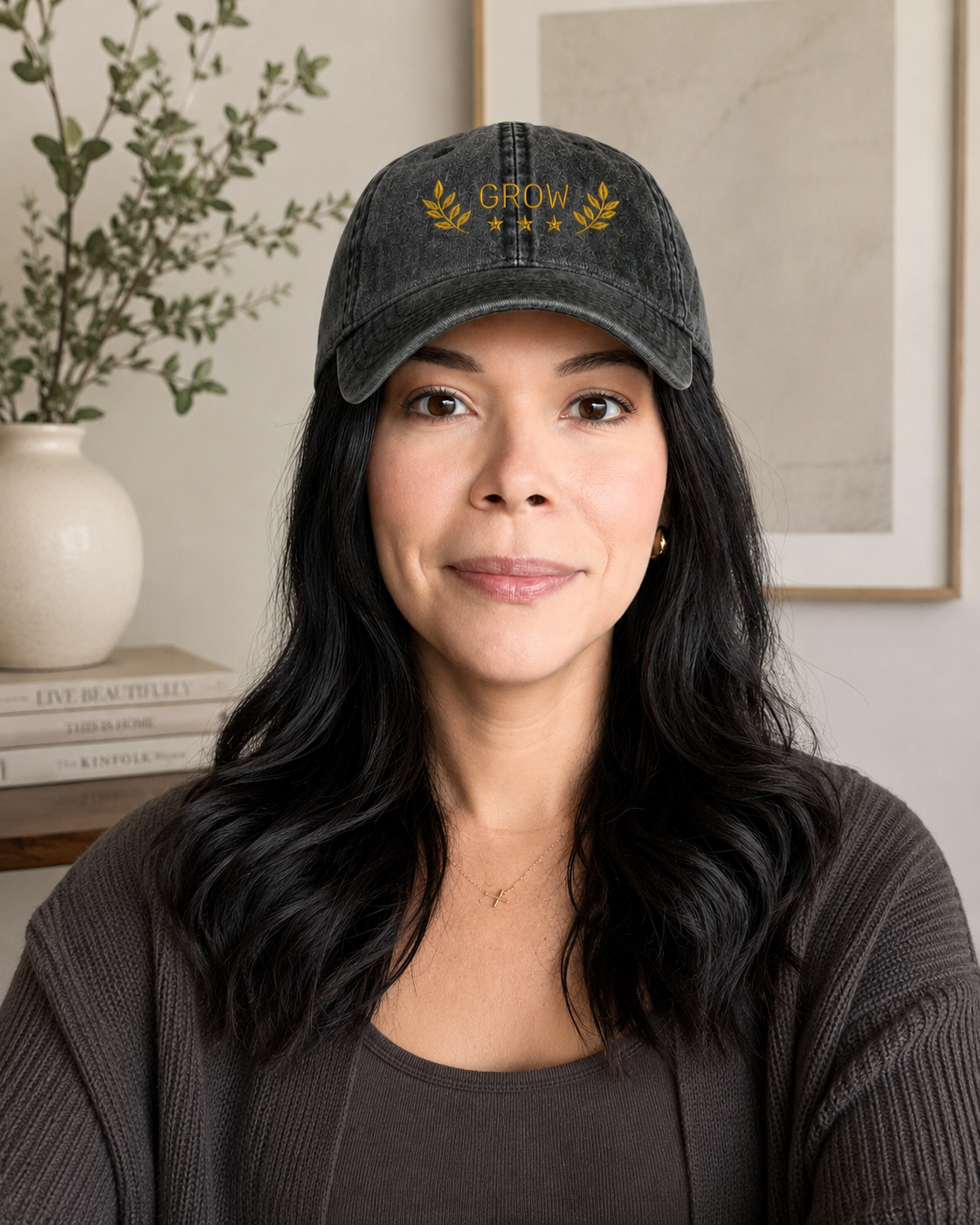 A women wearing a black hat that says grow.