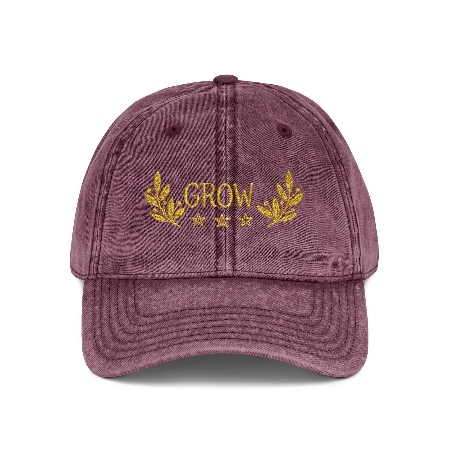Grow wording on a hat, the color is maroon.