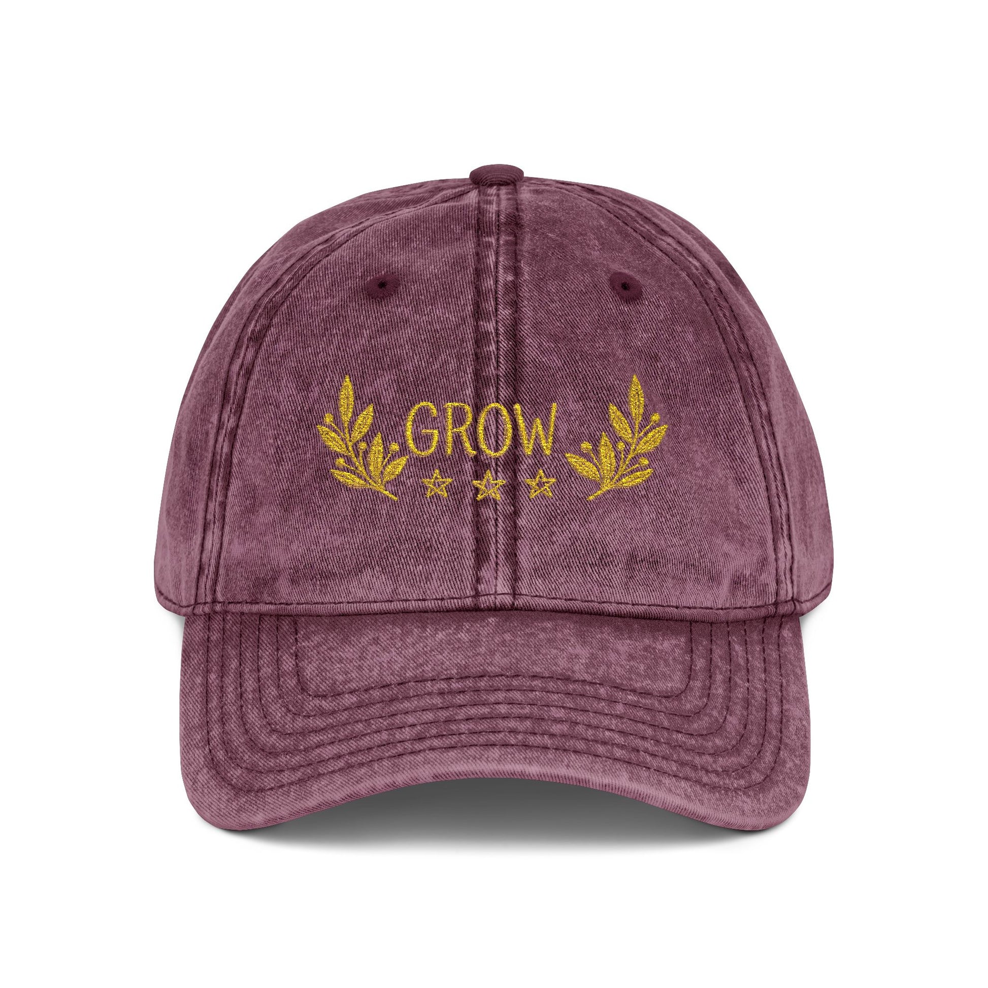Grow wording on a hat, the color is maroon.