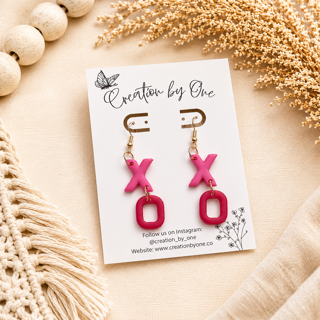 14k gold-plated hooks with X O design. 