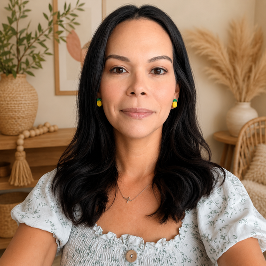 Women smiling wearing pineapple studs
