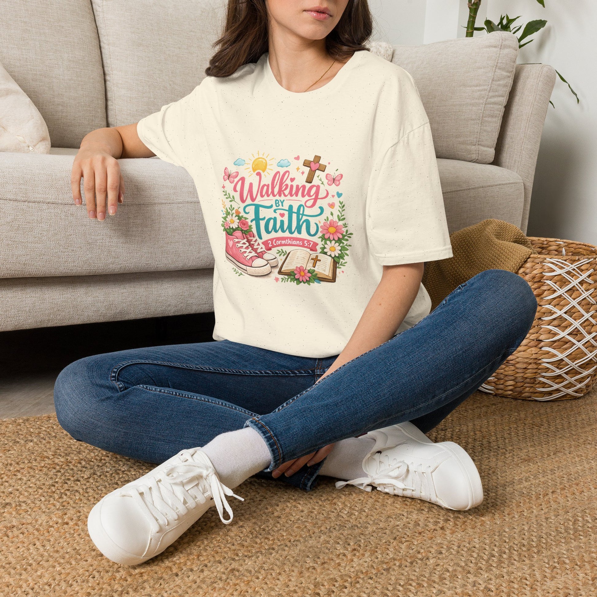Person wearing a t-shirt with 'Hive to Jar' design sitting on the floor.